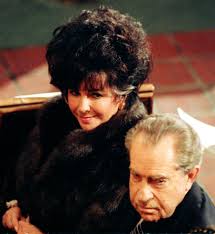 Liz Taylor sat with Richard Nixon at the 1990 funeral of mutual friend Malcolm Forbes.