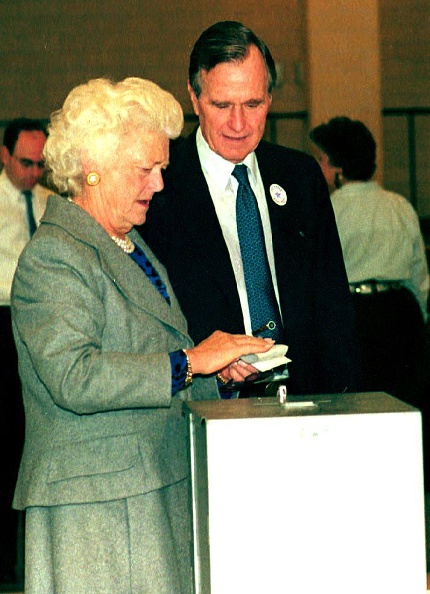George Bush watches as his wife Barbara Bush casts her vote on November 3, 1992 at St. Mary's Seminary polling place in Houston, Texas. She was devastated that he lost his reelection bid, the last incumbent President to do so.