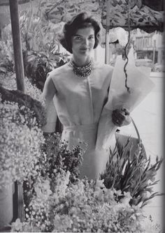 In the early days of her marriage, before caterers were usually hired to take care of her entire dinner party needs, Jackie Kennedy strolled out during the late morning to pick out her own flowers for the evening.