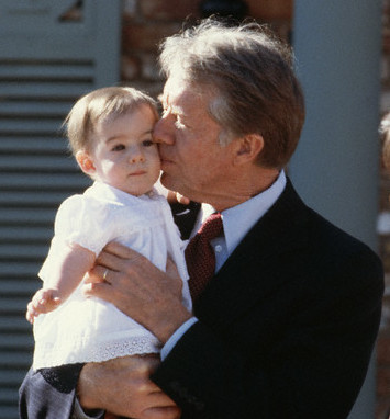 During a March 1979 visit to Elk City, Oklahoma, the President performed the proverbial political baby kiss, despite it not being a campaign year. (Corbis)