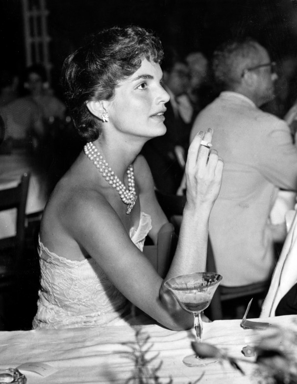Mrs. Kennedy, like many women who came of age in the Fifties, was a lifelong smoker - but rarely permitted herself to be caught puffing around a photographer.