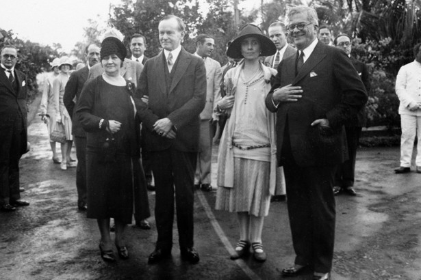 President Calvin Coolidge and First Lady Grace Coolidge (both standing at center) at the Havana estate of the Cuban President and First Lady General Gerardo Machado y Morales (far right) and his wife, Elvira Machado (far left). The Coolidges made the visit to Cuba to attend the Pan American Conference, January 19, 1928. (AP) 