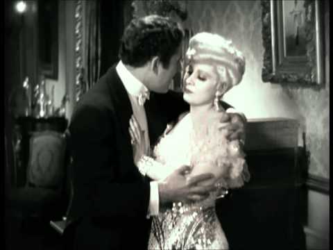 Thaet no-good Ace Lamont: John Miljan gets a little too lovey in 1936's Belle of the Nineties.
